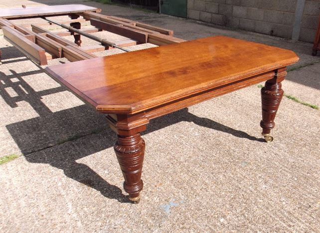 https://www.elisabethjamesantiques.co.uk/stockimages/huge-victorian-4-metre-dining-table-13ft-arts-and-crafts-influenced-walnut-extending-dining-table-with-orifinal-leaf-keep-1136-P3.jpg